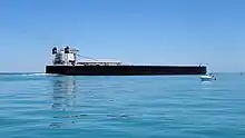 The American Integrity on Lake St. Clair heading to the St. Clair River empty and riding high. Looking at the stern.