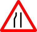 5b) — Road narrows on the left