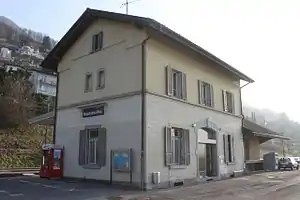 Two-story building with gabled roof