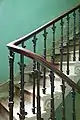 Main staircase. The staircase goes not just to the first floor but to the top of the house. It has iron balustrades, these are a feature of many Regency homes in Brighton. Brighton produced much cast iron.