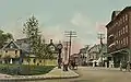 A postcard illustrating a view north along Main Street beside the park (c. 1908)