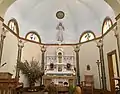 Main altar with fall decorations set up by the parishioners.