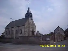 The town hall and church in Erquinvillers