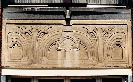 Bas-relief panel on the facade of the Maison Aglave, Brussels (1898)