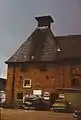 Maltings at brewery being used for car repairs late 1970s