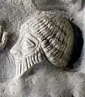 A prisoner from Lagash on the Victory Stele. The same hairstyle can be seen in other statues from Lagash.