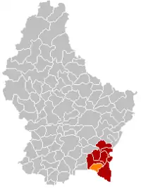 Map of Luxembourg with Mondorf-les-Bains highlighted in orange, and the canton in dark red