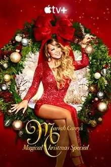 Mariah Carey sitting on a giant wreath in front of a red background