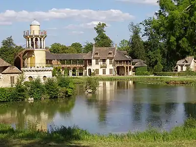 Rustic hamlet created for Marie-Antoinette by Richard Mique and Hubert Robert at the Palace of Versailles (1783–1785)