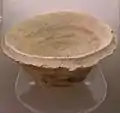 A clay bowl discovered on Marlik Hill, Egyptian Rosicrucian  Museum, San Jose, California. This type of bowl could contain the ration of a day laborer who was forced to work.