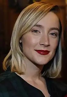 Saoirse Ronan smiling at the camera