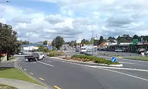 The roundabout Don Buck Road / Triangle Road in Massey North.