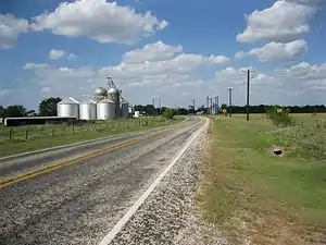 Silos along FM 950 as it approaches FM 102