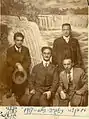 1917: Baruch Ostrovsky (sitting in the center) with members of "Poale Zion". Yizhak Ben-Zvi, the second president of Israel, standing at the right. The other members are Kaplan and Barels.