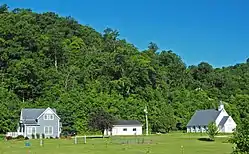 A house and chapel in Mazeppa Township