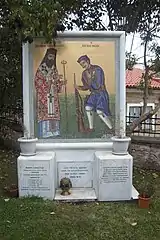 A memorial depicting Germanos Karavangelis (left) and Pavlos Melas (right).