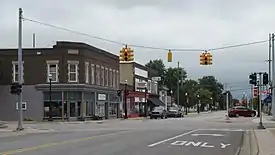 Looking north along N. Midland Road at M-46