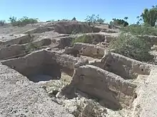 A large plaza in front of the Mesa Grande Temple mound which was enclosed by a large adobe wall.