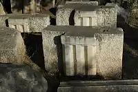 Triglyph blocks with slots for the insertion of metopes in the Marmaria at Delphi