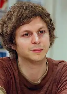 A young man with matted hair.