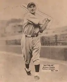 Mickey Haslin with a baseball bat in a baseball uniform.