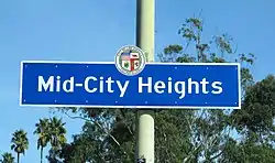 Mid-City Heights neighborhood sign  on West Boulevard as it crosses over the Santa Monica Freeway.