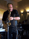 Burney playing saxophone live