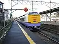 JR East Hakuchō limited express departing northbound from the Misawa train station.