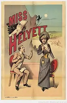 theatre poster showing a young man with neat moustache and beard,  seated and looking up at a young woman in severely sober grey dress and hat