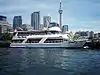 Miss Toronto Cruise Ship along the Toronto Harbour shoreline.