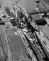 The USS Missouri fitting tightly in a canal lock