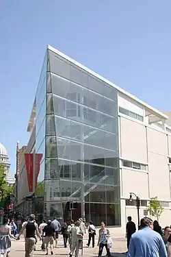 MMoCA building with its glass facade and Icon staircase on the corner of State St. and Henry St.