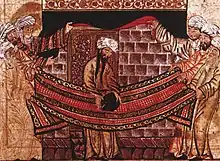 Miniature of Muhammad rededicating the Black Stone at the Kaaba. From Jami Al-Tawarikh, c. 1315