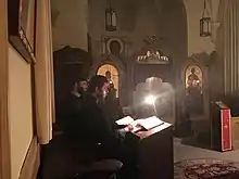 Monks praying Compline