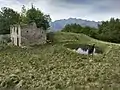 Mount Tavagnone, ruins of the former farmstead formerly owned by Battista Corsetti of Turano, known as "Prandini," with the watering hole built "ex novo" in 2011 by the ERSAF Lombardy, its current owner