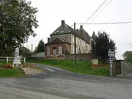 The street skirts the hill where the church stands with its cemetery