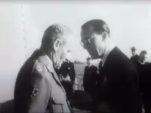 Chairman Bernard Montgomery of the C-in-C Committee wearing the badge when meeting Dutch Prince Bernhard aboard HNLMS Tromp in July 1949 during Exercise Verity.