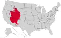 The Mormon corridor, highlighted in red. Striped counties contain major Mormon populations, but are not considered to be a part of the cardinal regions of their states.