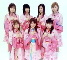 Morning Musume Sakuragumi, 2004.Top row (L to R): Asami Konno, Eri Kamei, Risa Niigaki, Hitomi YoshizawaBottom row (L to R): Mari Yaguchi, Ai Takahashi, Ai Kago