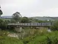 Road bridge over the Laborec river, with Volica in the background