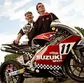 Mike Edwards (left) and bike builder Mark Hanna proudly display their winners trophy.