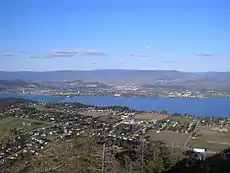 From the top east ridge, looking over Okanagan Lake towards Kelowna.