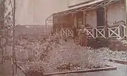 Evalina McHardy (William's wife) in front of the house before the master bedroom was added in 1908.