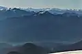 Mount Watson (centered) seen from the slopes of Mount Baker. Bacon Peak to left, Baker Lake at bottom of frame.