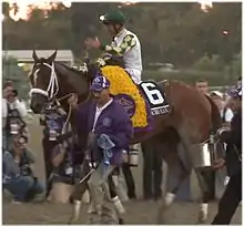 Mucho Macho Man with his jockey Gary Stevens