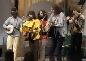 L-R: Bill Keith, Clarence White, David Grisman, Peter Rowan, Richard Greene. Hidden behind R. Greene: Stuart Schulman.