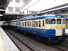 A 115-300 series EMU set on a Musashino service, March 2004