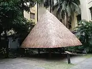 A model of an Ifugao house in the courtyard of the building.