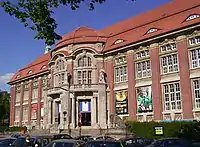 Photograph of a multi story brick building