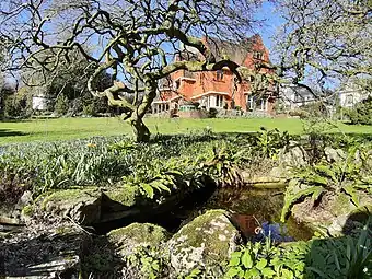 A view of the house through part of the restored garden (2019)